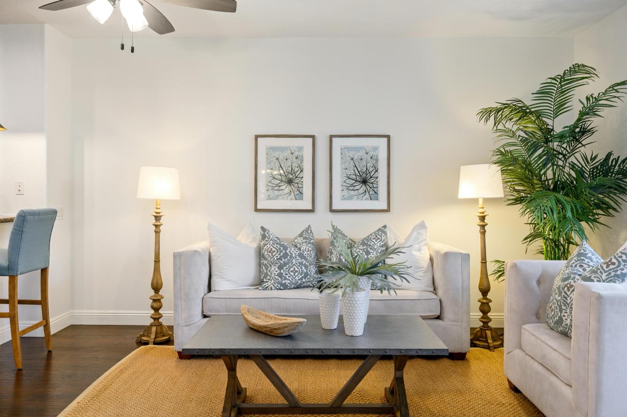 Room with gray sofa after swap